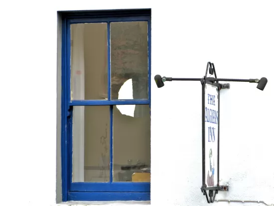 Blue window with hanging sign