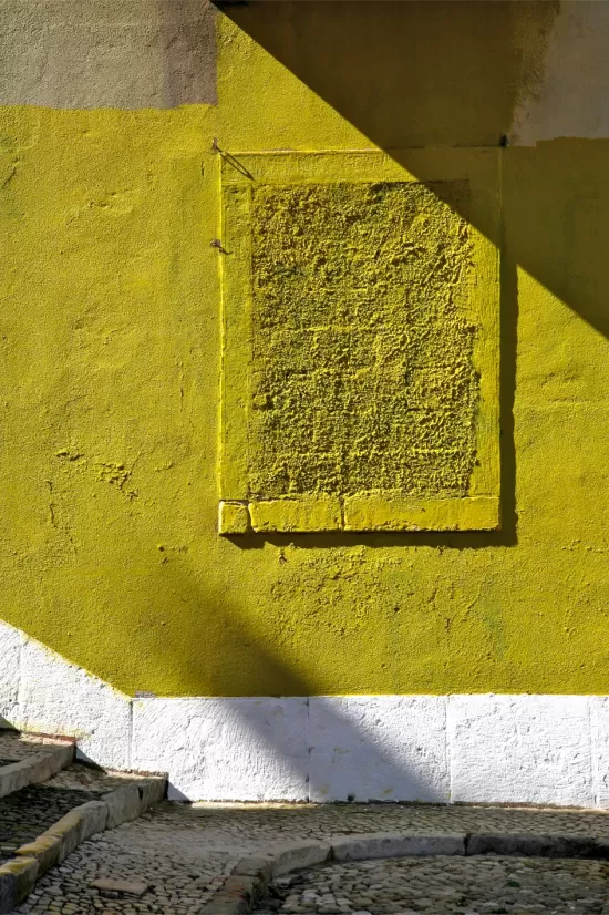 Shadows on yellow wall