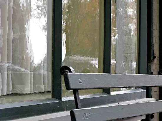 Bench in front of picture window