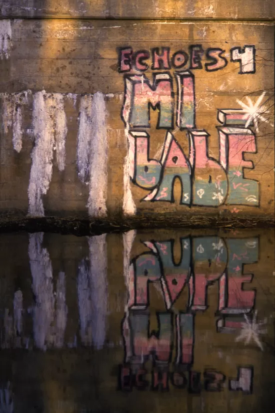 Grafiti reflected in water