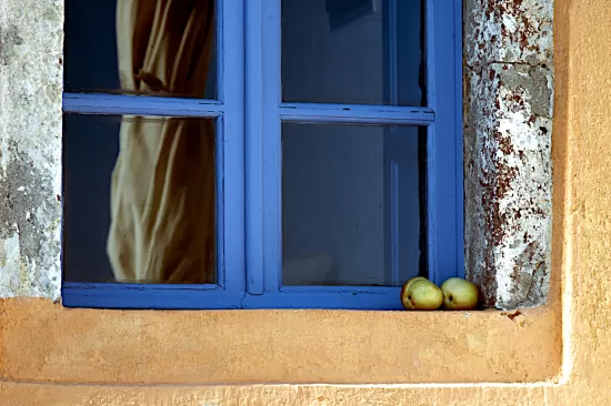 Window with blue frame, and fruit